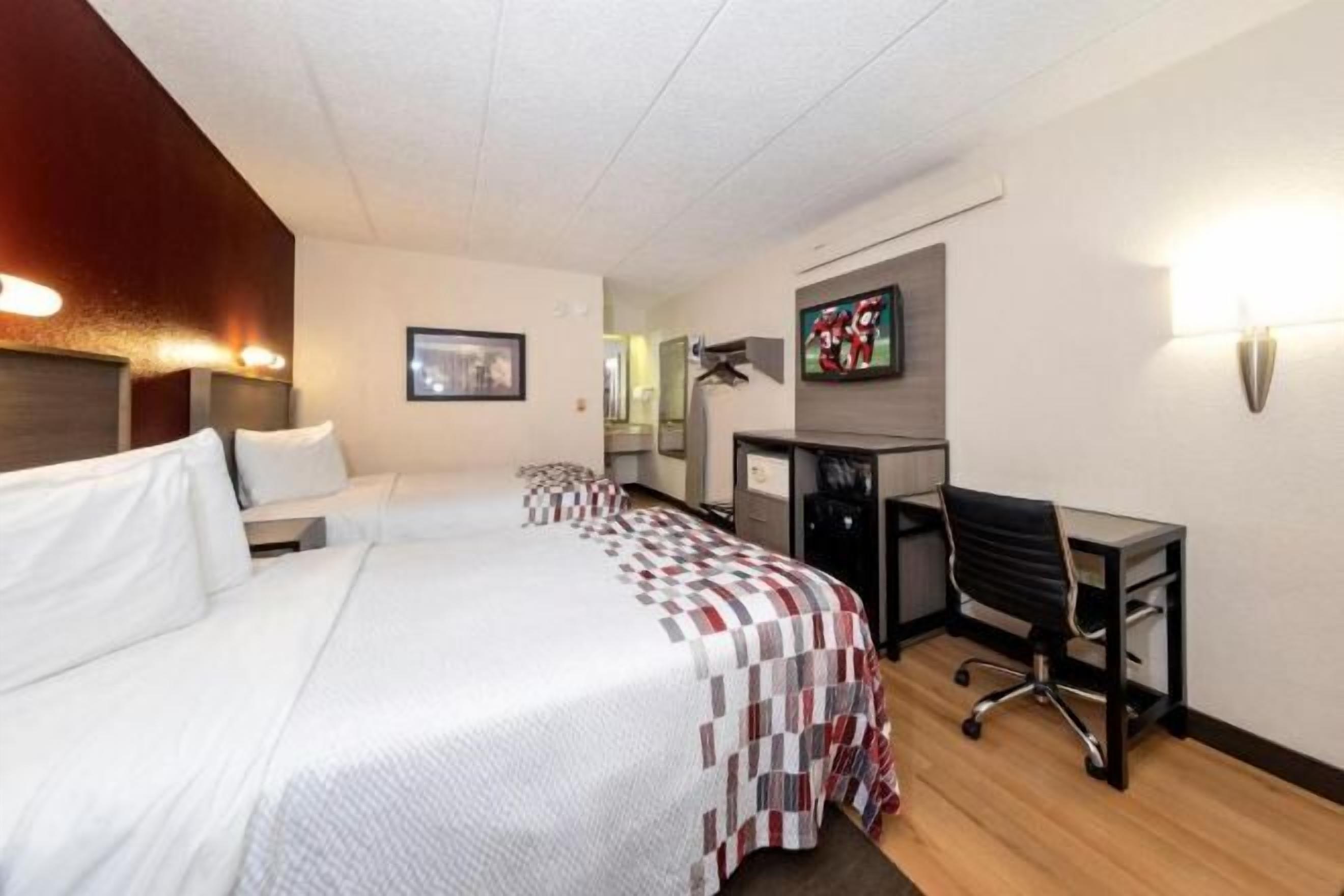 Desk, blackout drapes, free cribs/infant beds, rollaway beds