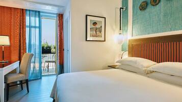 Classic Double Room, Balcony, Garden View | Minibar, in-room safe, free WiFi, bed sheets