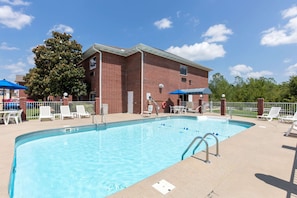 Seasonal outdoor pool, open 10:00 AM to 10:00 PM, sun loungers