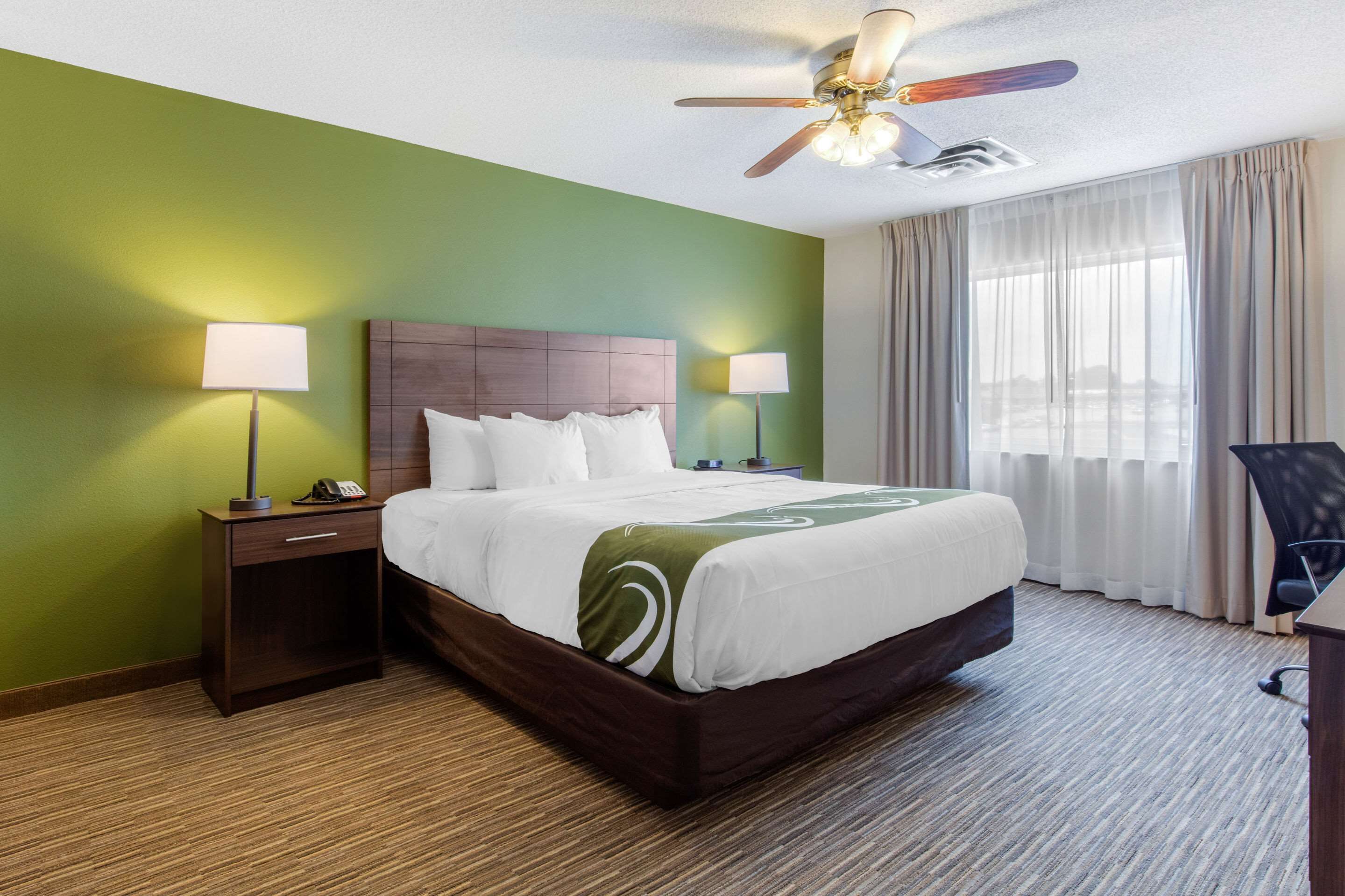 desk, blackout curtains, iron/ironing board, free cots/infant beds