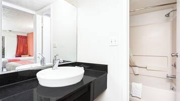 Room, 2 Double Beds, Non Smoking | Bathroom | Hair dryer, towels, soap, shampoo
