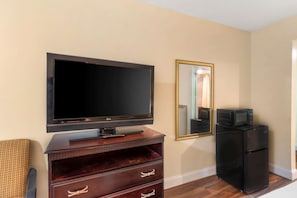 Desk, blackout curtains, iron/ironing board, rollaway beds