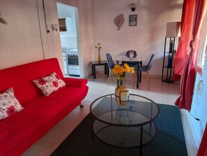 Standard Apartment, 1 Bedroom | Living area | TV