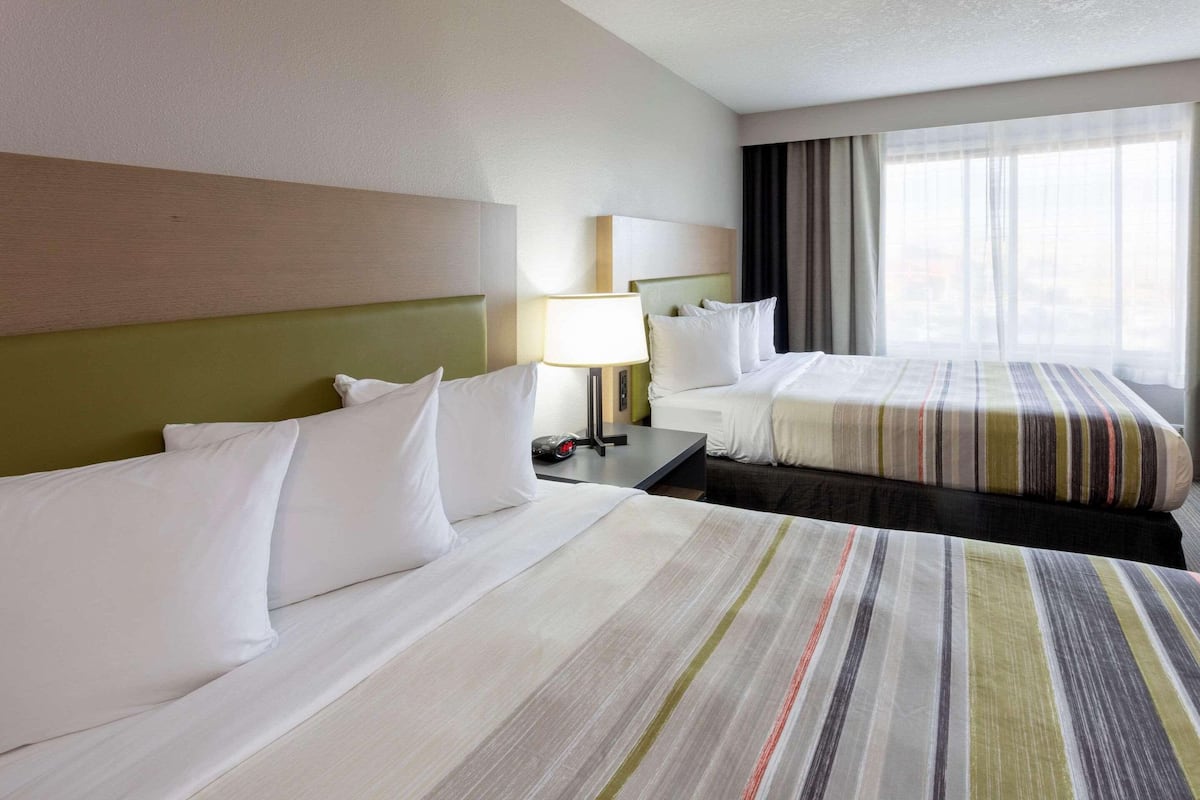 Premium bedding, down comforters, pillowtop beds, desk