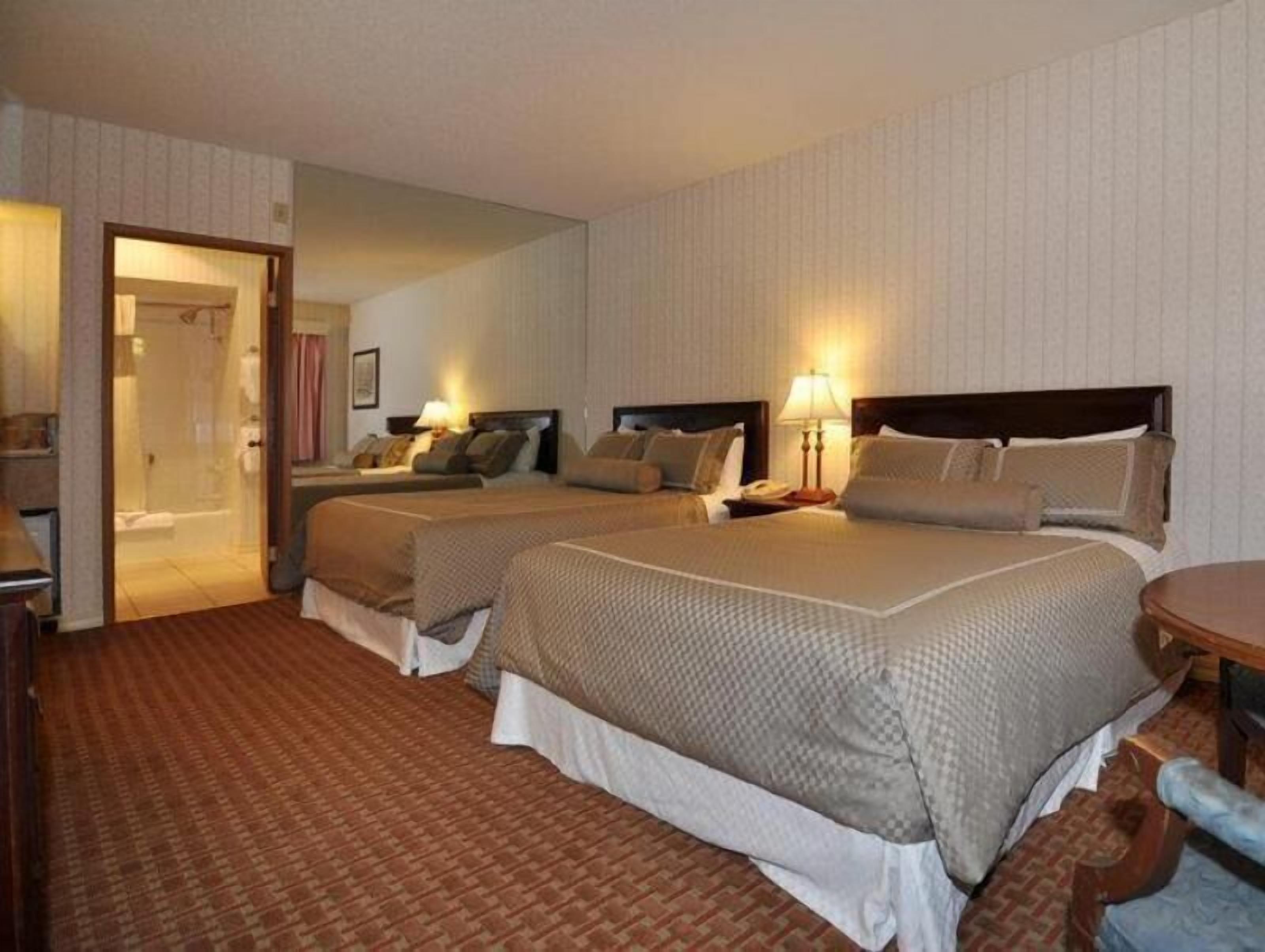 Premium bedding, desk, laptop workspace, blackout curtains