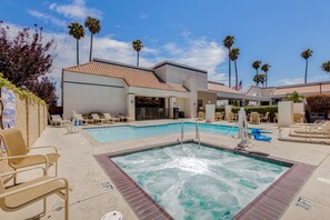 Outdoor pool, open 6:00 AM to 11:00 PM, sun loungers