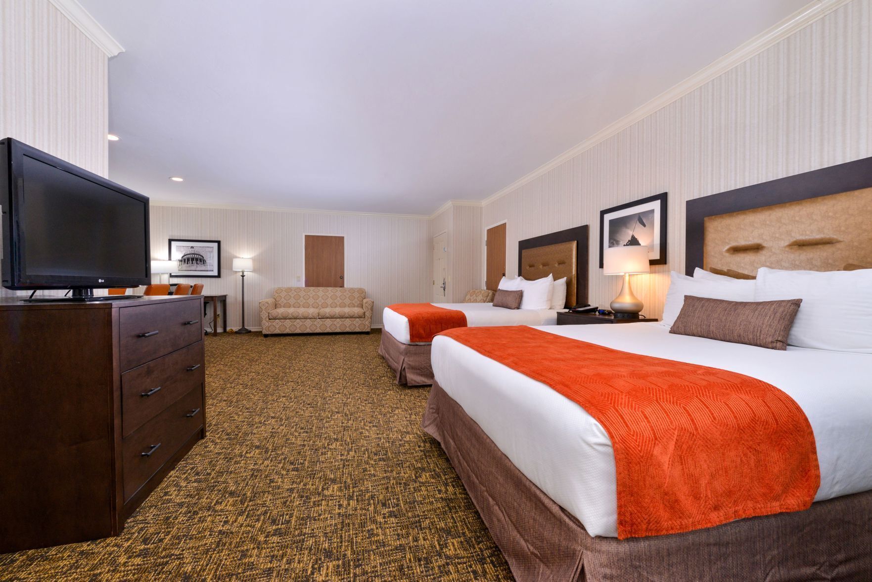 Premium bedding, desk, laptop workspace, blackout curtains