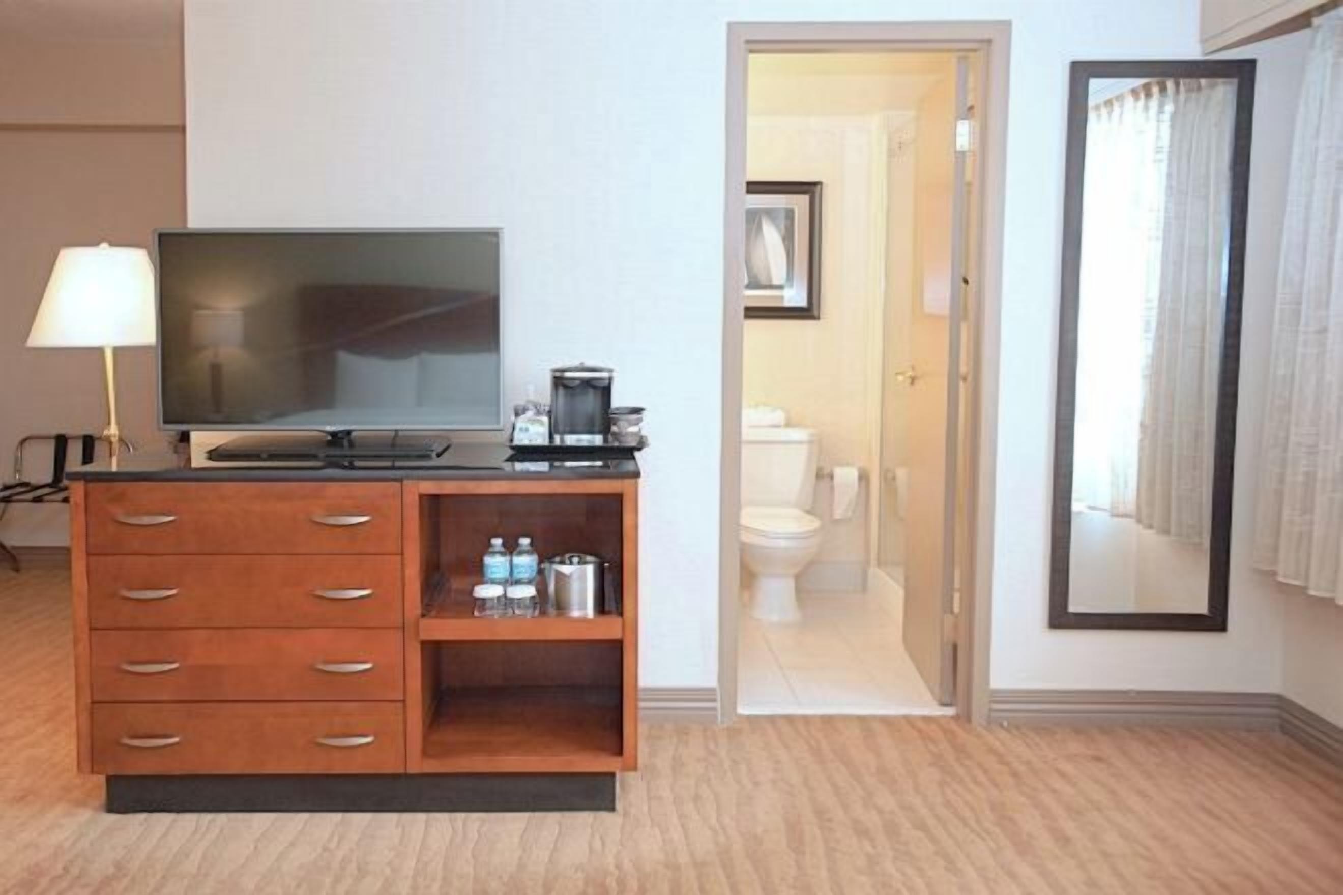 Premium bedding, down comforters, pillowtop beds, in-room safe