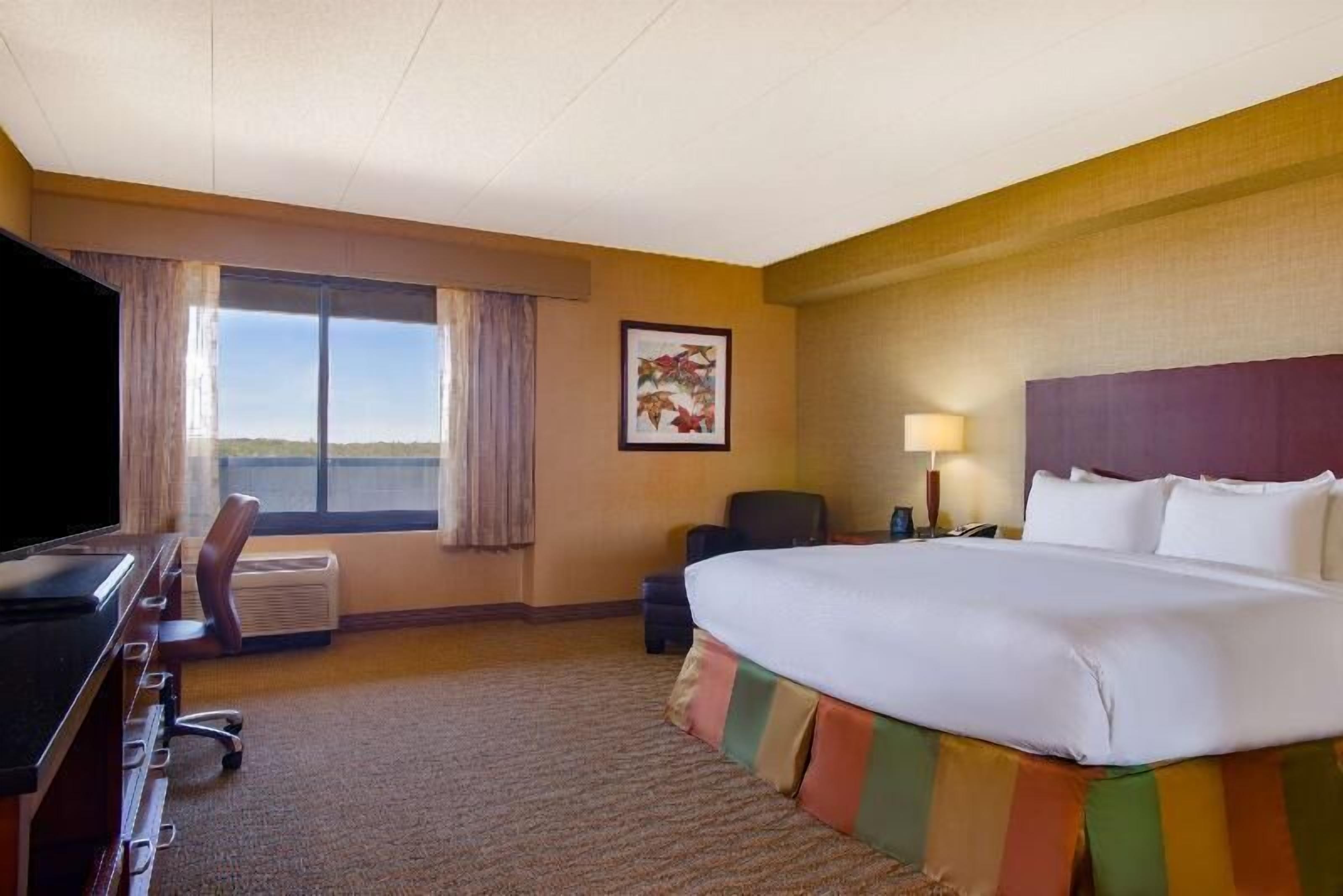 Premium bedding, down comforters, pillowtop beds, in-room safe