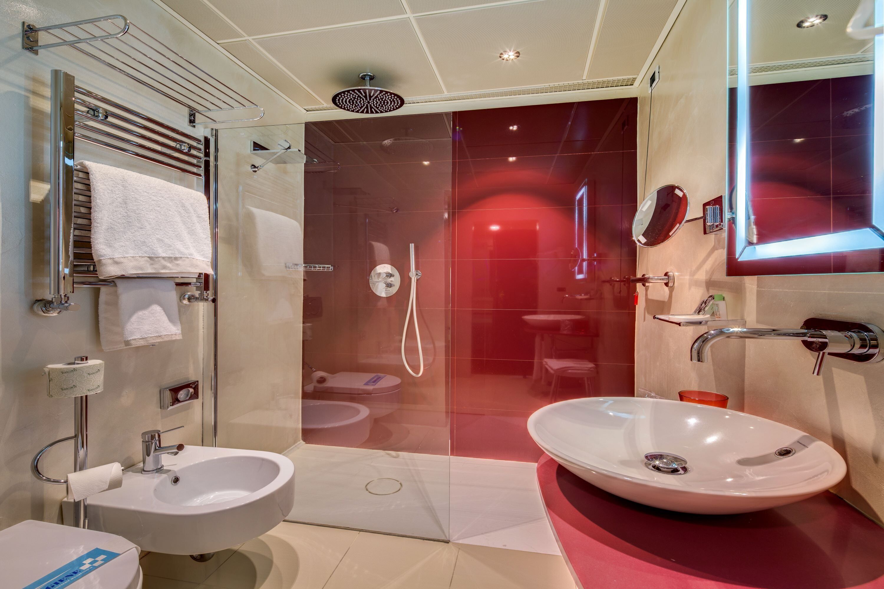 combined shower/bathtub, rainfall showerhead, designer toiletries