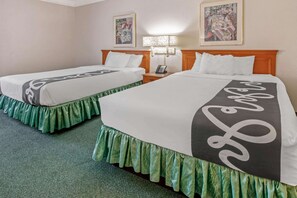 Premium bedding, desk, iron/ironing board, free cribs/infant beds