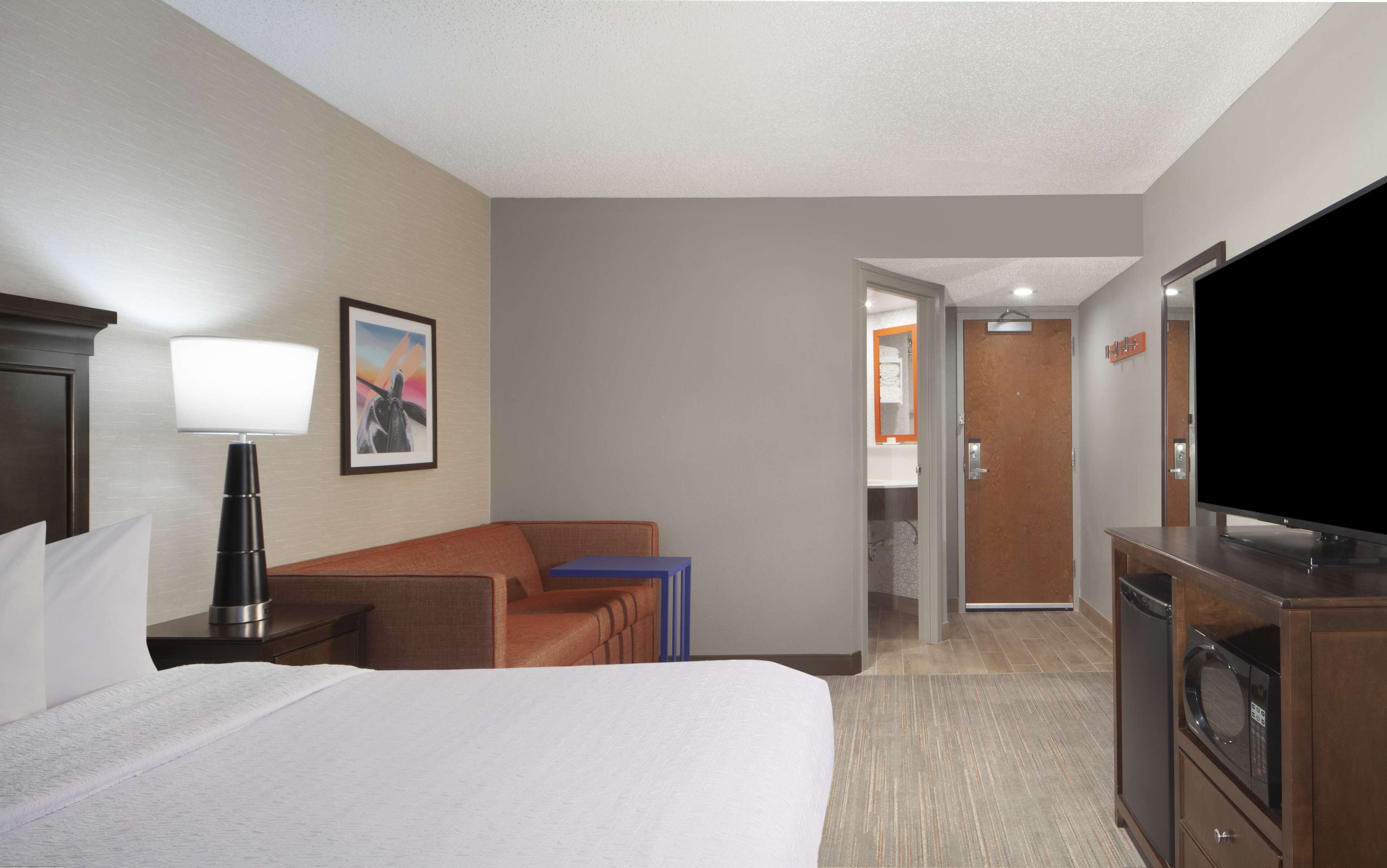 studio, 1 king bed with sofa bed, non smoking (study) | living area | 42-inch flat-screen tv with cable channels, tv