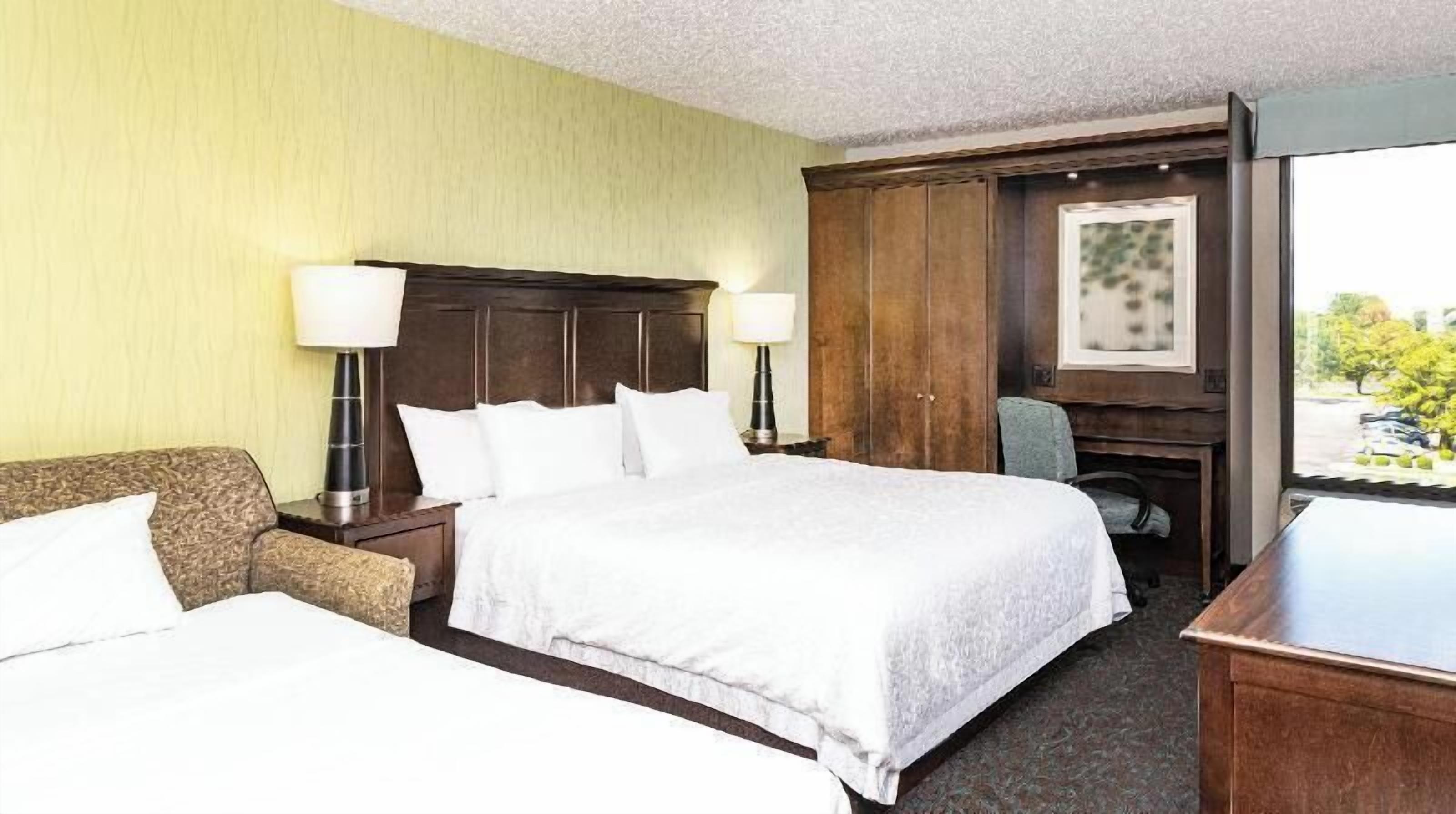 Premium bedding, down comforters, desk, laptop workspace