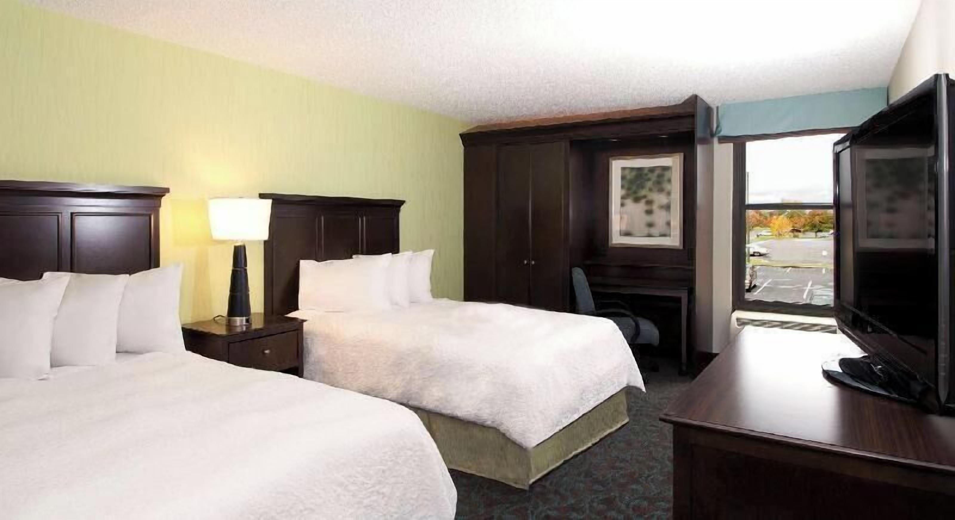 Premium bedding, down comforters, desk, laptop workspace