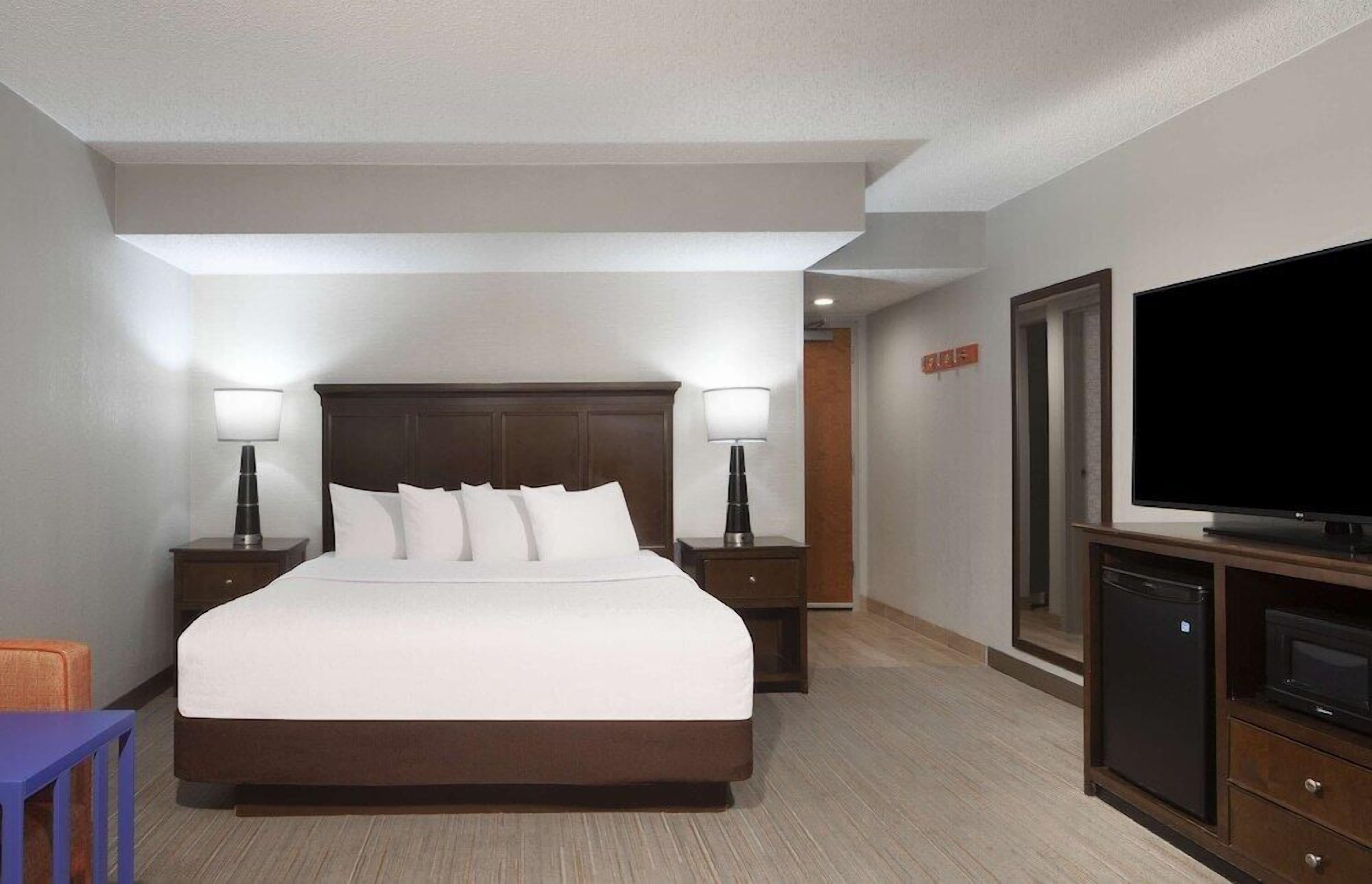 Premium bedding, down comforters, desk, laptop workspace