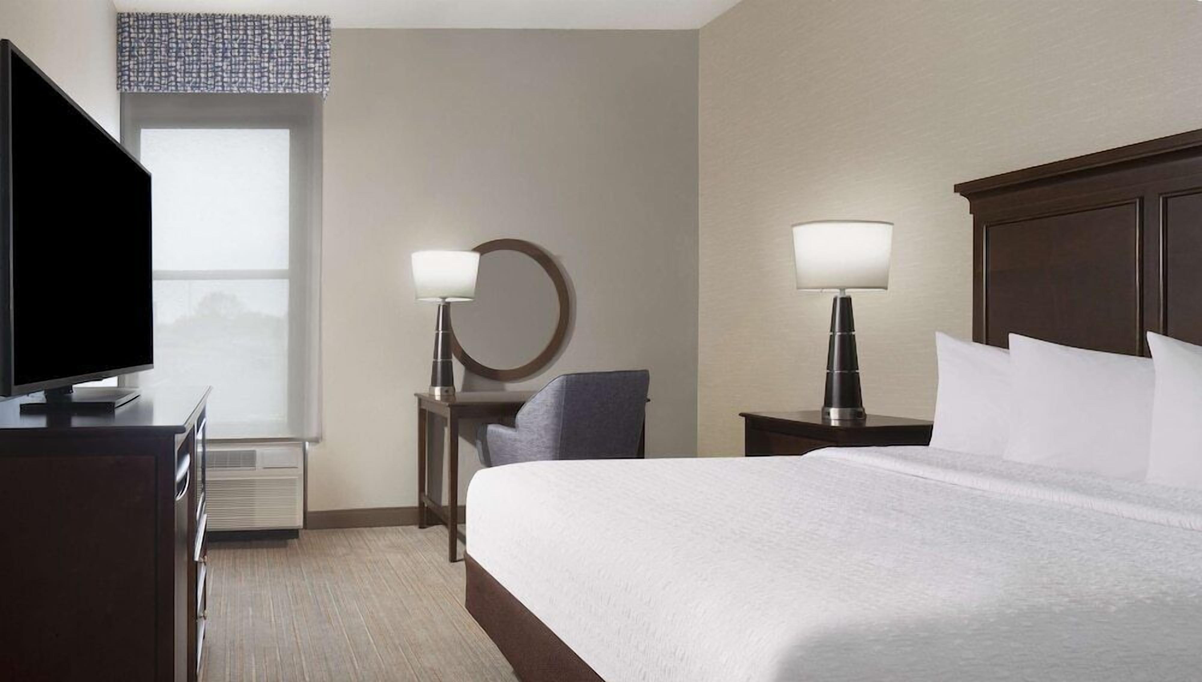 Premium bedding, down comforters, desk, laptop workspace