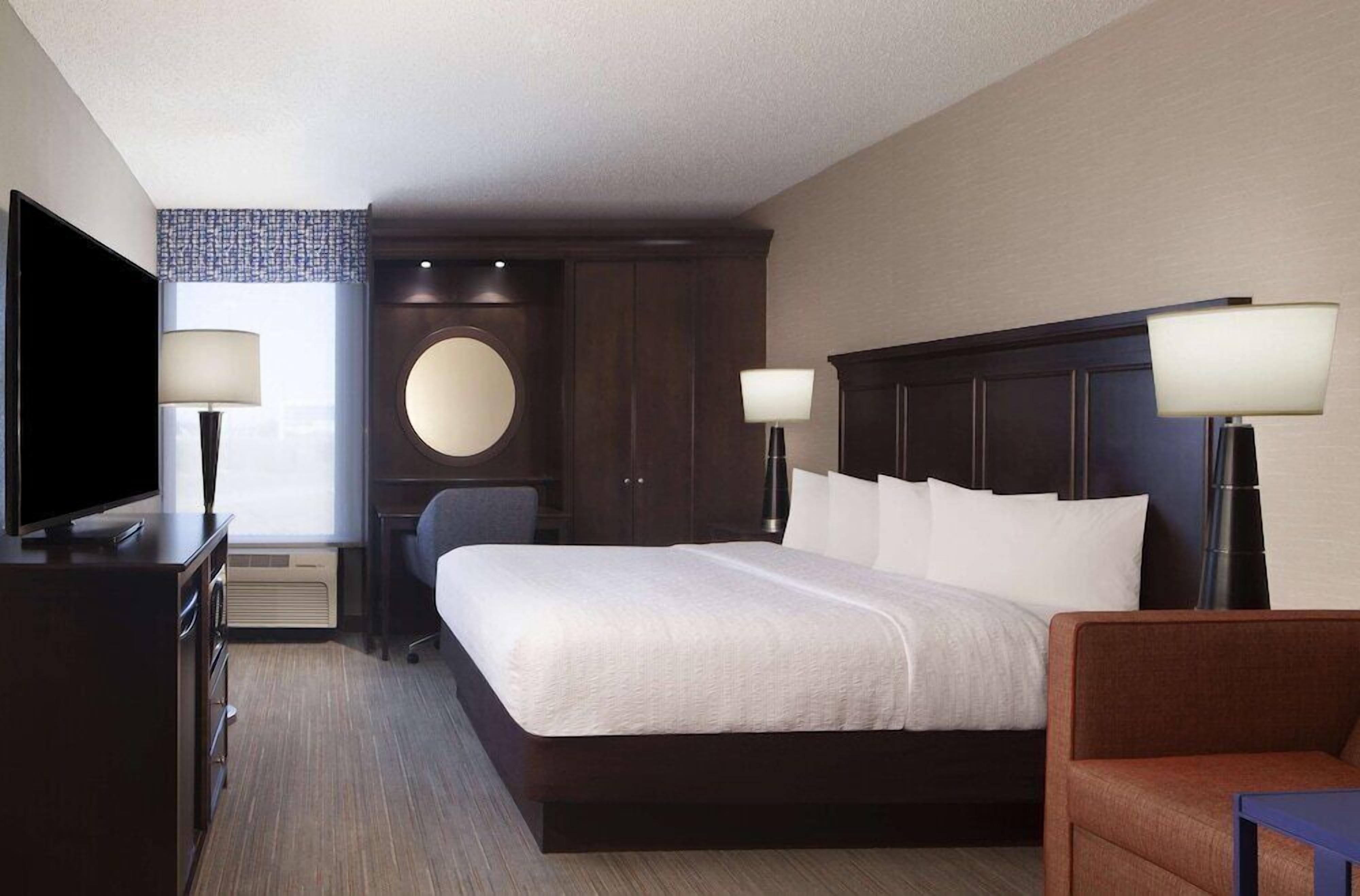Premium bedding, down comforters, desk, laptop workspace
