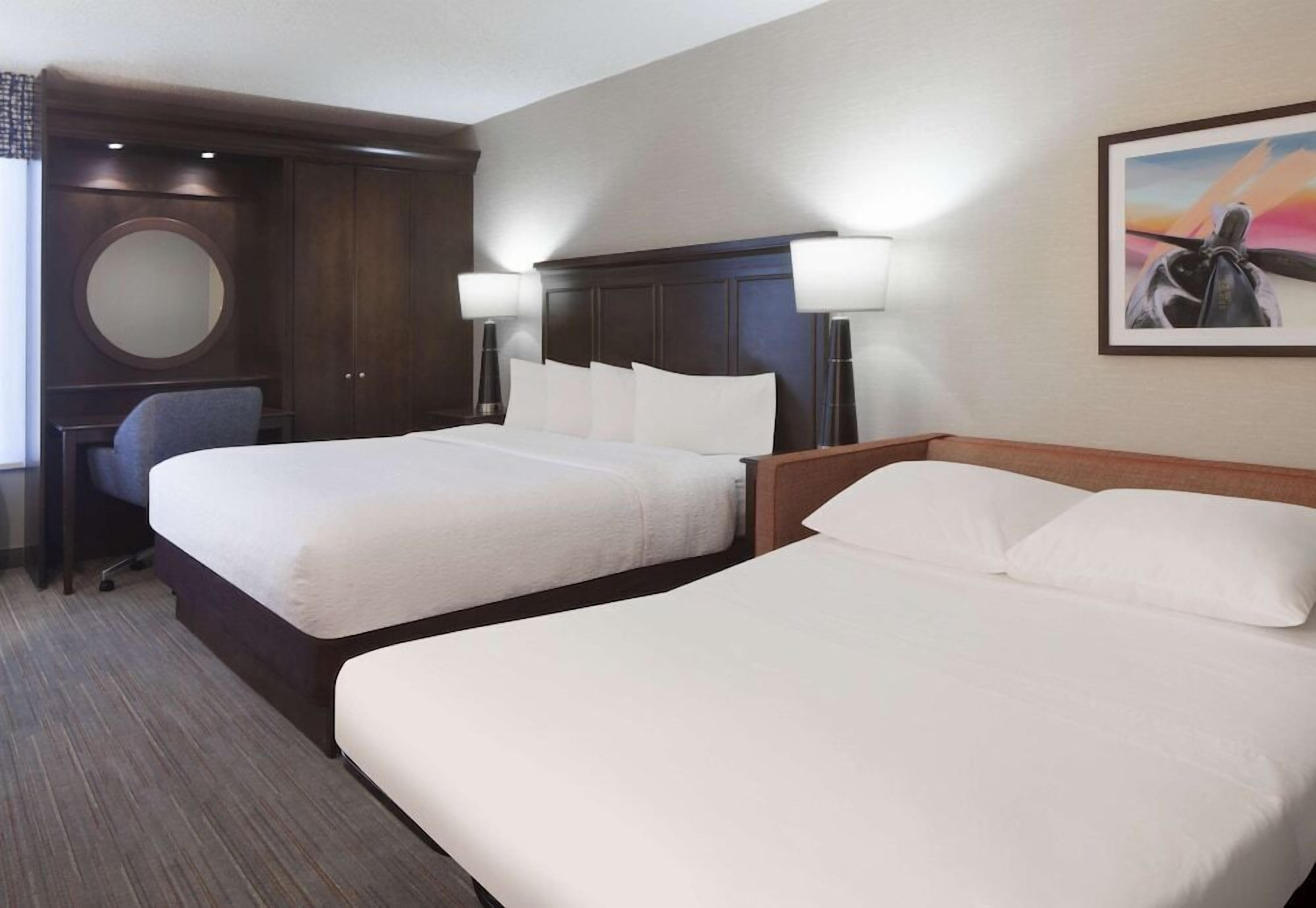 Premium bedding, down comforters, desk, laptop workspace
