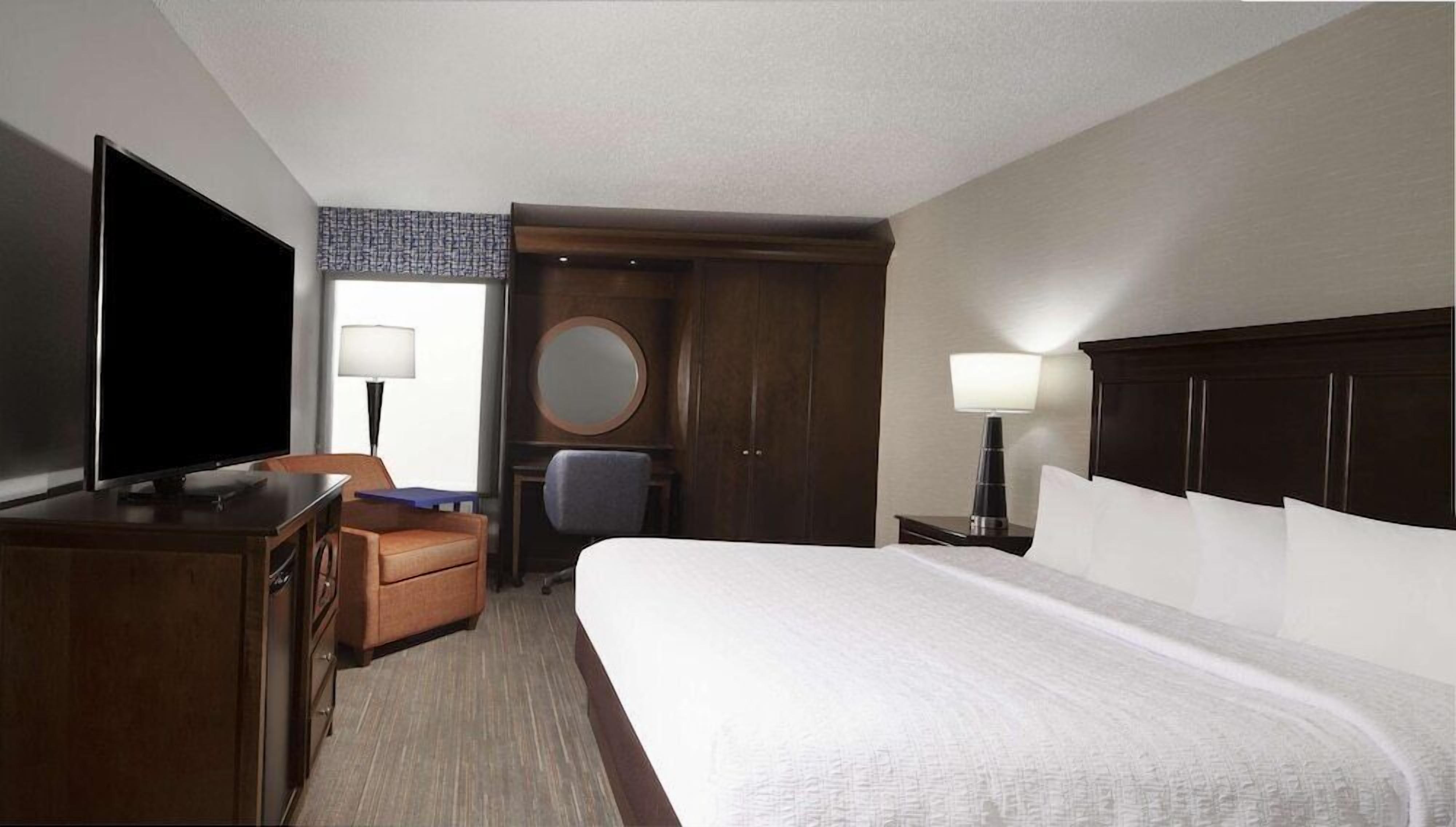 Premium bedding, down comforters, desk, laptop workspace