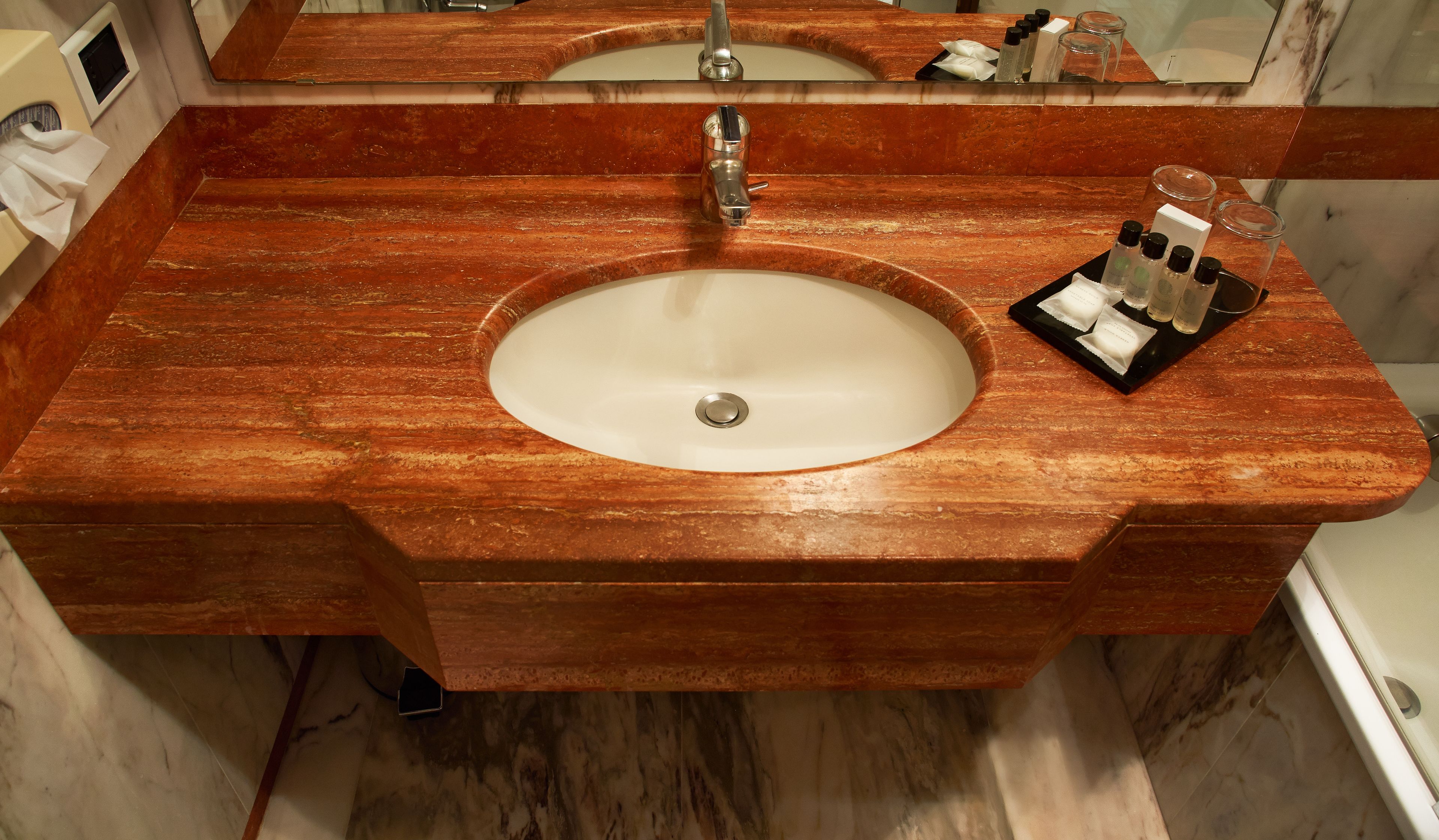 combined shower/bathtub, free toiletries, hair dryer, slippers