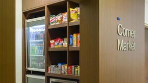 A corner market with refrigerated and non-refrigerated shelves stocked with snacks and beverages. - Best Western Allentown Bethlehem Lehigh Valley Inn & Suites (Bethlehem)
