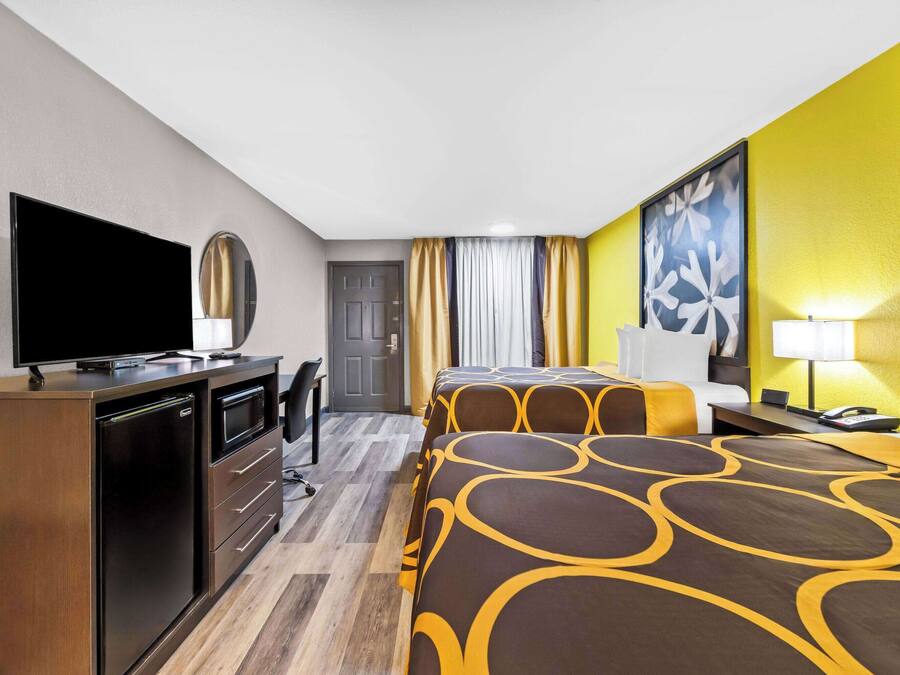 Room, 2 Queen Beds, Non Smoking | Soundproofing, iron/ironing board, cribs (free), WiFi (free)