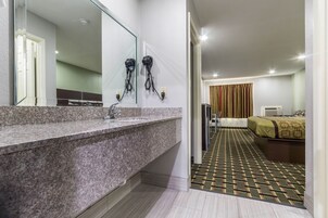 Deluxe Suite, 1 King Bed | Bathroom | Bathtub, free toiletries, hair dryer, towels