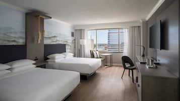 Premium bedding, down comforters, pillowtop beds, in-room safe