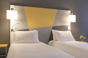 Premium bedding, down duvets, pillow-top beds, in-room safe