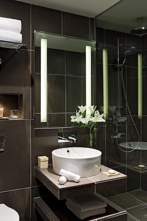 Eco-friendly toiletries, hair dryer, bathrobes, slippers