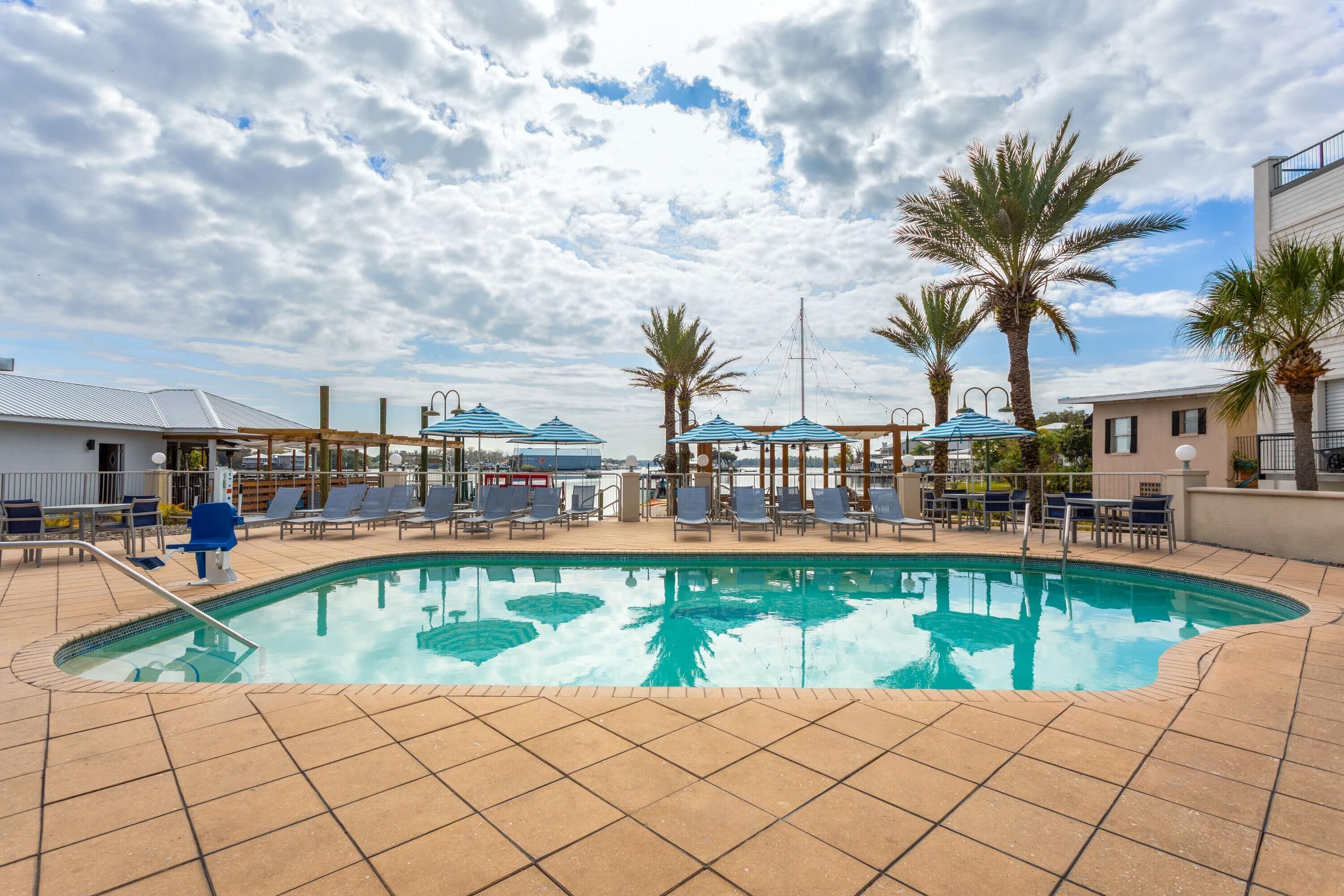 Outdoor pool, pool umbrellas, pool loungers