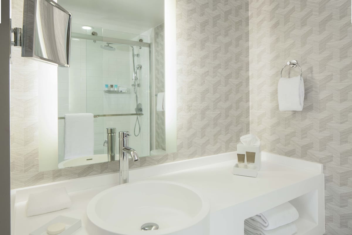 rainfall showerhead, free toiletries, hair dryer, bathrobes