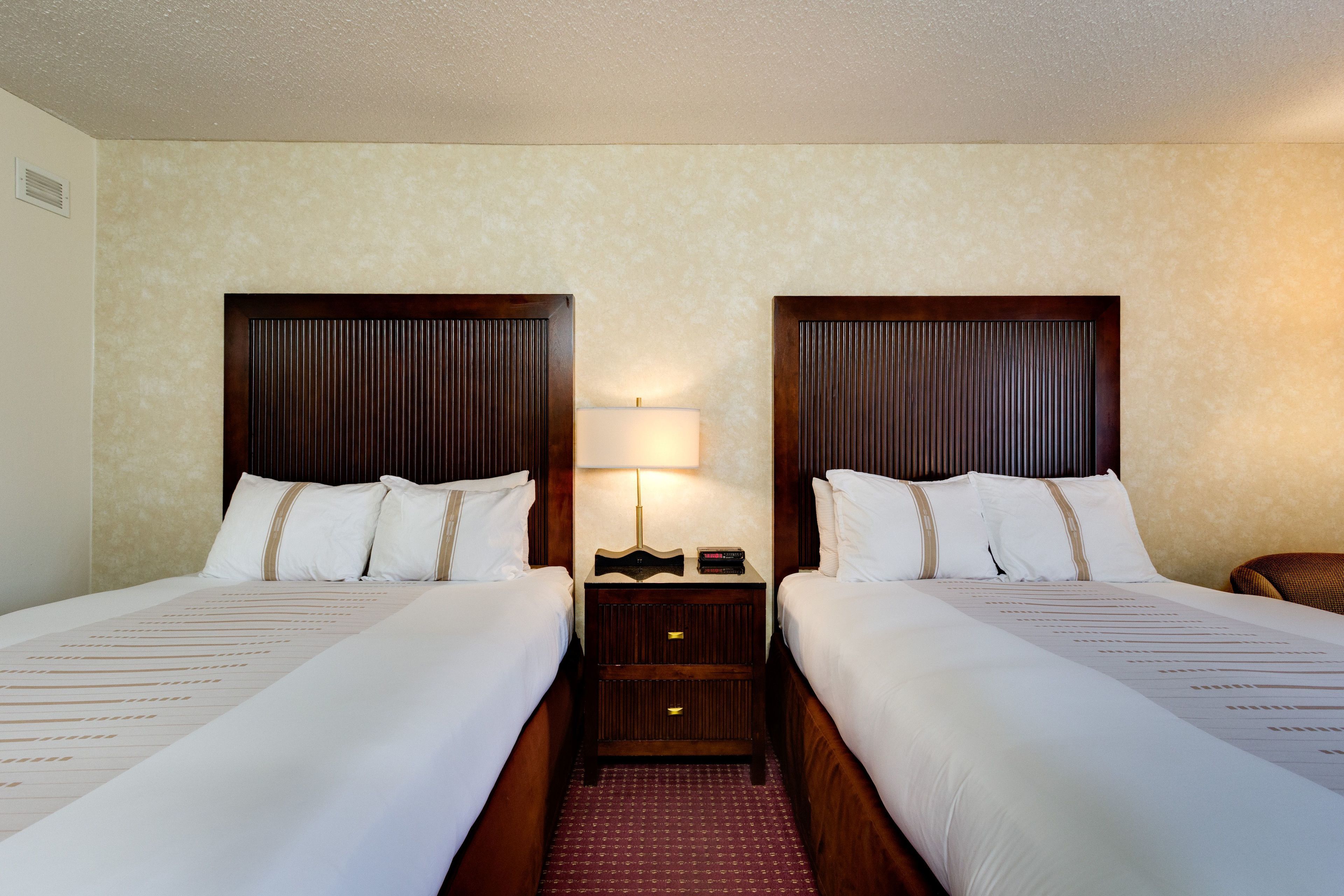 premium bedding, down duvets, desk, laptop workspace