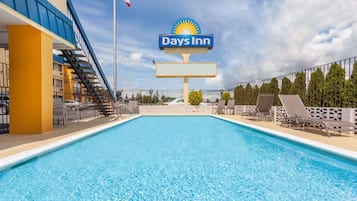 Seasonal outdoor pool, open 10:00 AM to 10:00 PM, sun loungers