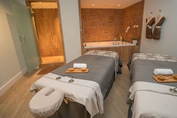 Couples treatment rooms, sauna, spa tub, steam room, body treatments at Eden Roc Miami Beach