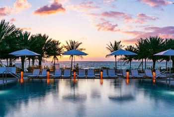 3 outdoor pools, cabanas (surcharge), pool umbrellas at Eden Roc Miami Beach