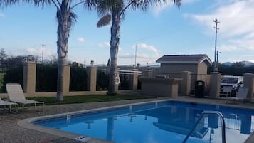 Seasonal outdoor pool, sun loungers