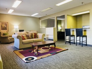 Suite, 1 King Bed | In-room safe, desk, iron/ironing board, free cribs/infant beds