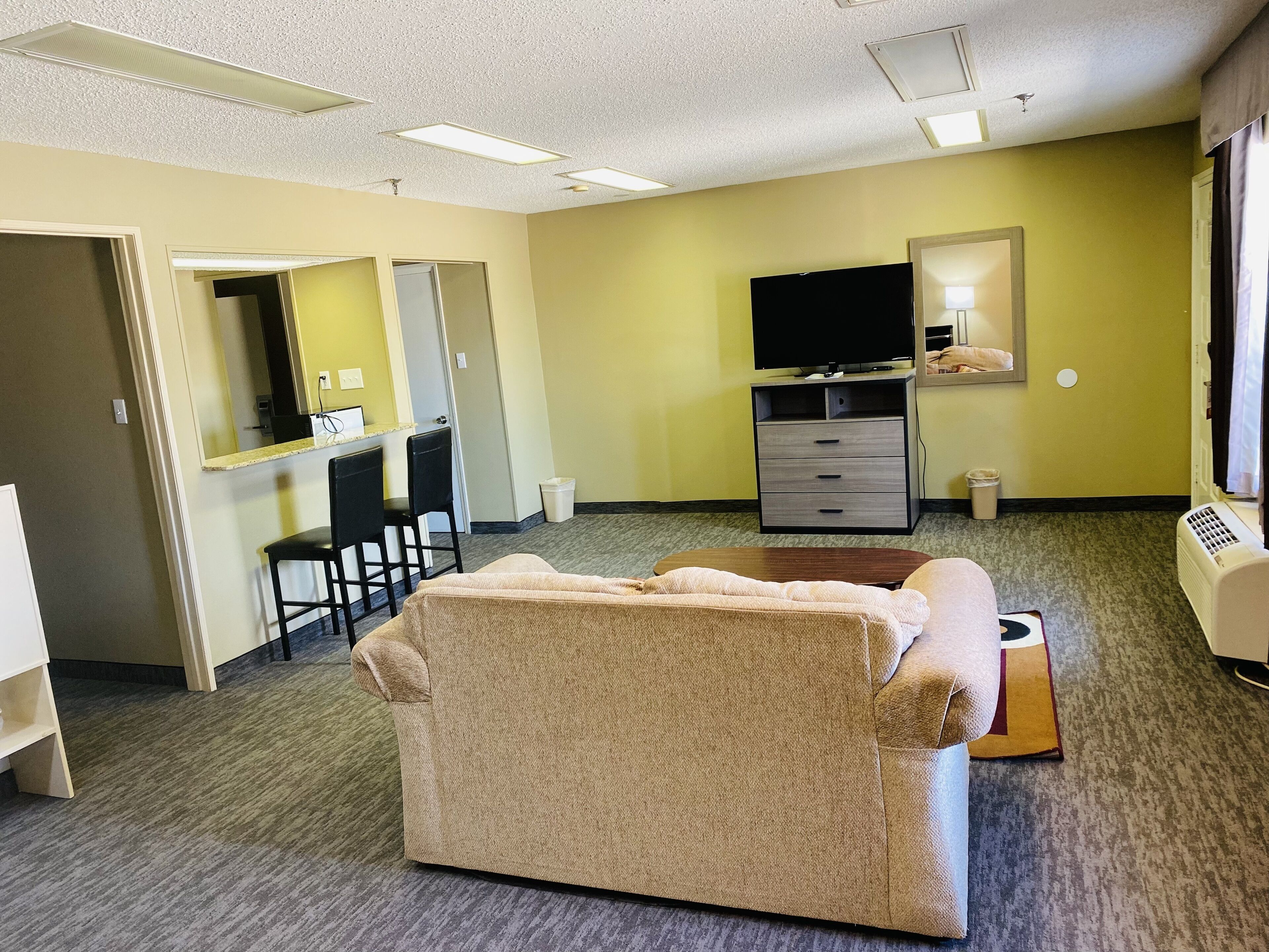 Suite, 1 King Bed | In-room safe, desk, iron/ironing board, free cribs/infant beds
