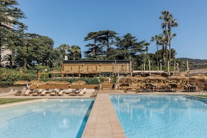 Seasonal outdoor pool, pool cabanas (surcharge), pool umbrellas