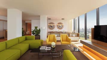 A modern living room with a sectional sofa, yellow armchairs, a coffee table, and a large TV screen.