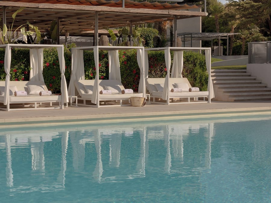 Seasonal outdoor pool, cabanas (surcharge), pool umbrellas