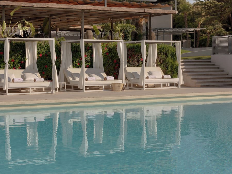 Seasonal outdoor pool, cabanas (surcharge), pool umbrellas