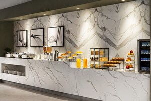 Daily buffet breakfast (CAD 18.00 per person)