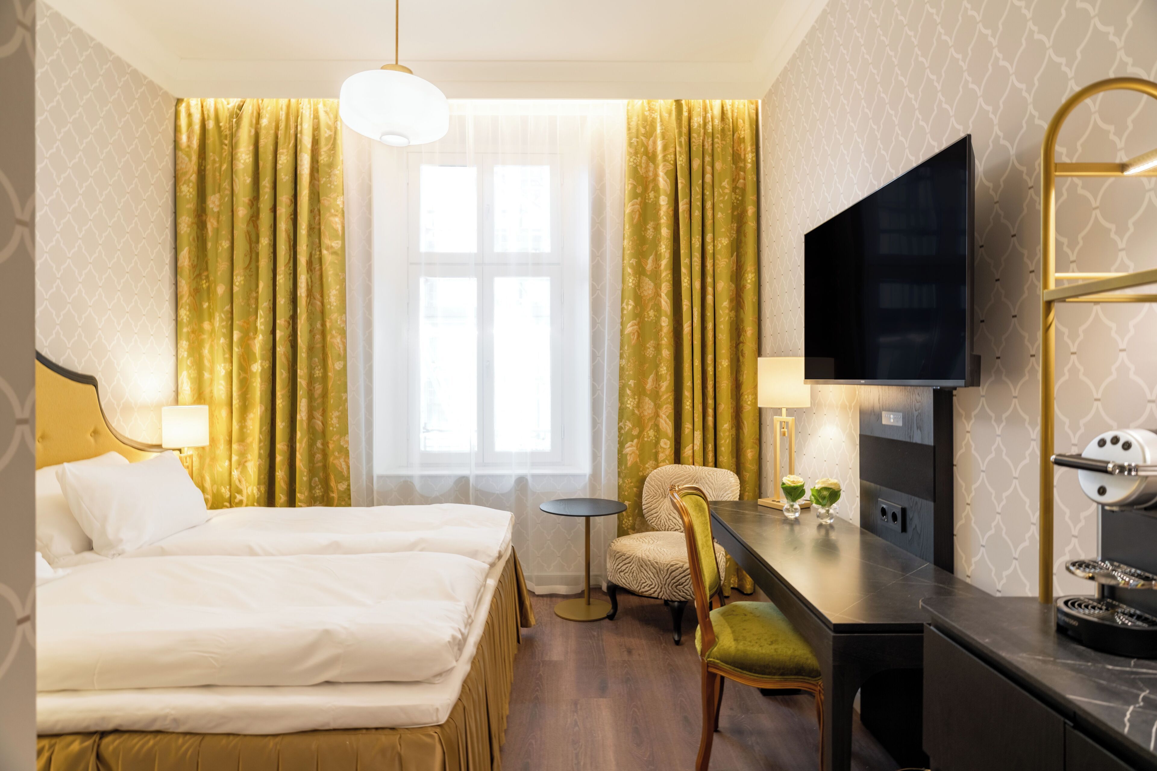 Down comforters, minibar, in-room safe, individually decorated