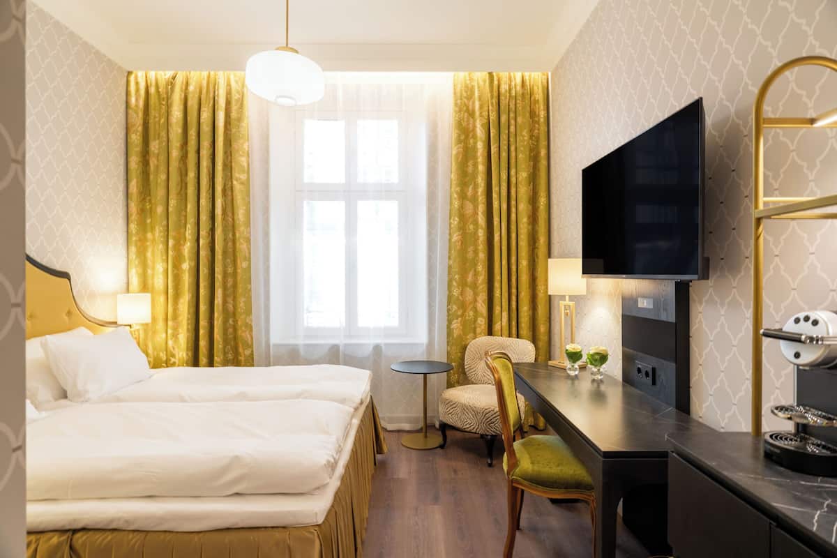 Down comforters, minibar, in-room safe, individually decorated