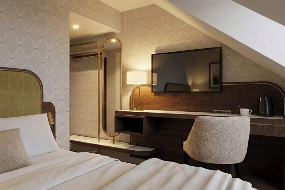 Couette en duvet d'oie, minibar, coffres-forts dans les chambres