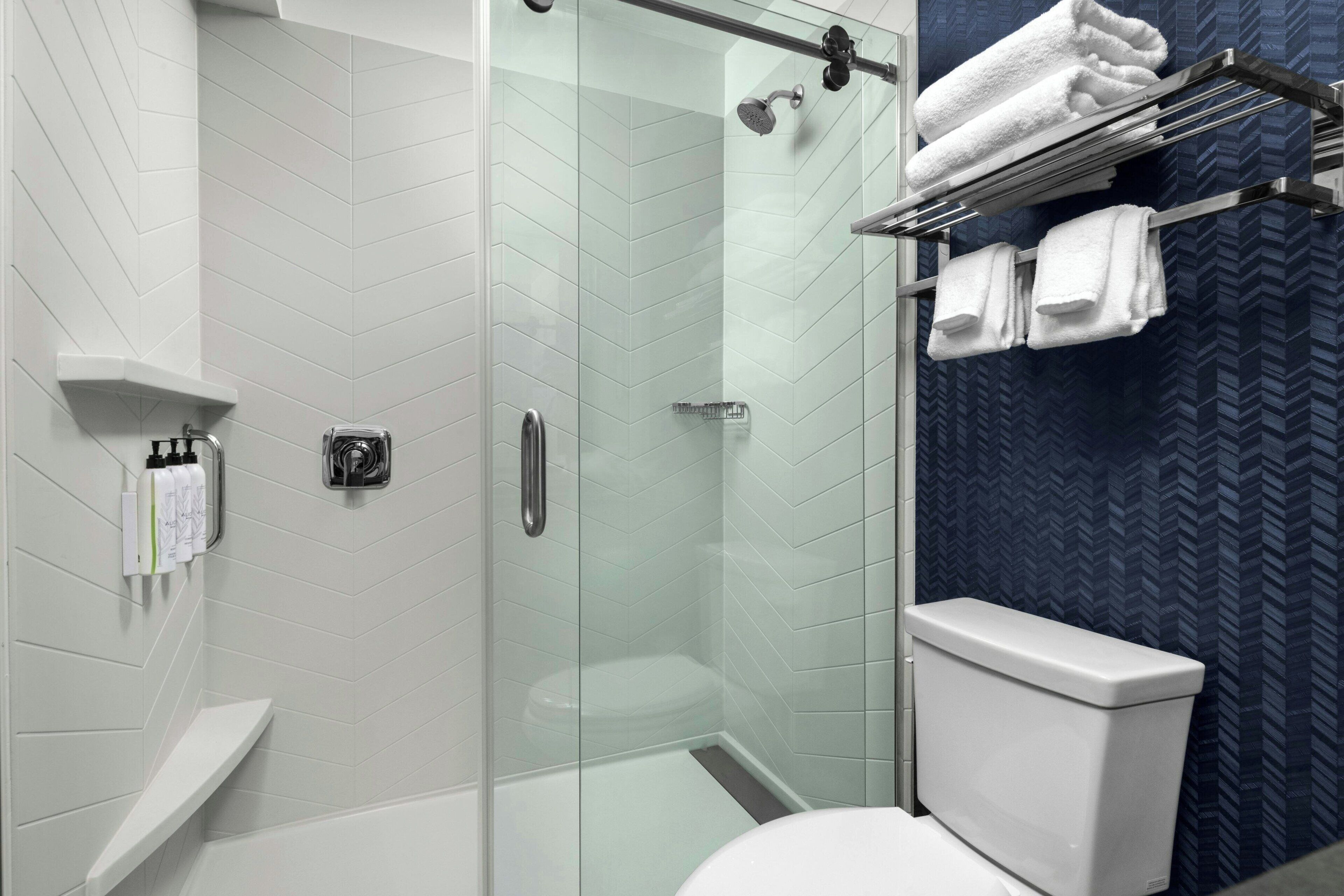 combined shower/bathtub, free toiletries, hair dryer, towels