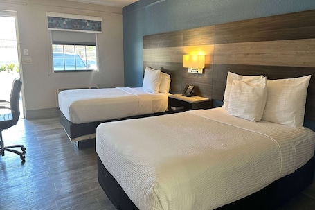 Premium bedding, desk, iron/ironing board, free cribs/infant beds