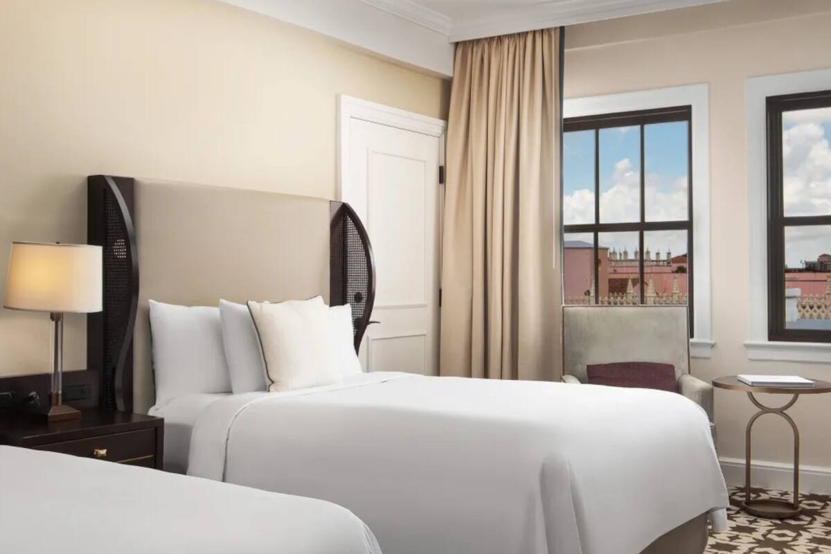 Premium bedding, free minibar, in-room safe, laptop workspace